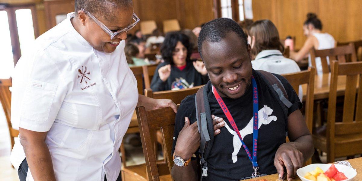 Student Brian Muganda and Chef Tanya Holland in Oliver Hall in September 2022