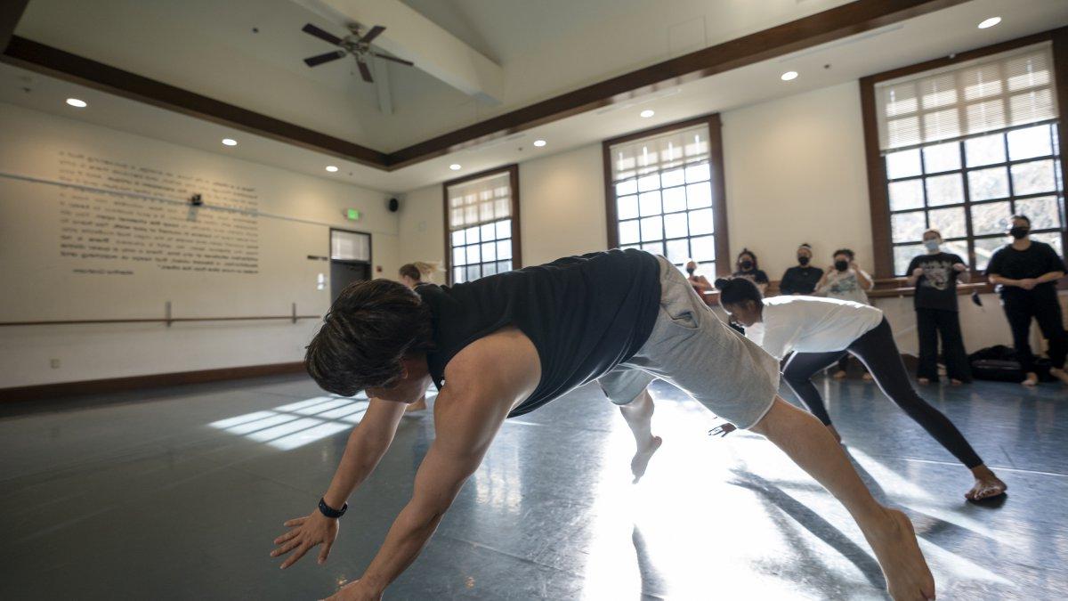 Photo of Rogelio Lopez, Instructor/Program Director midair teaching 