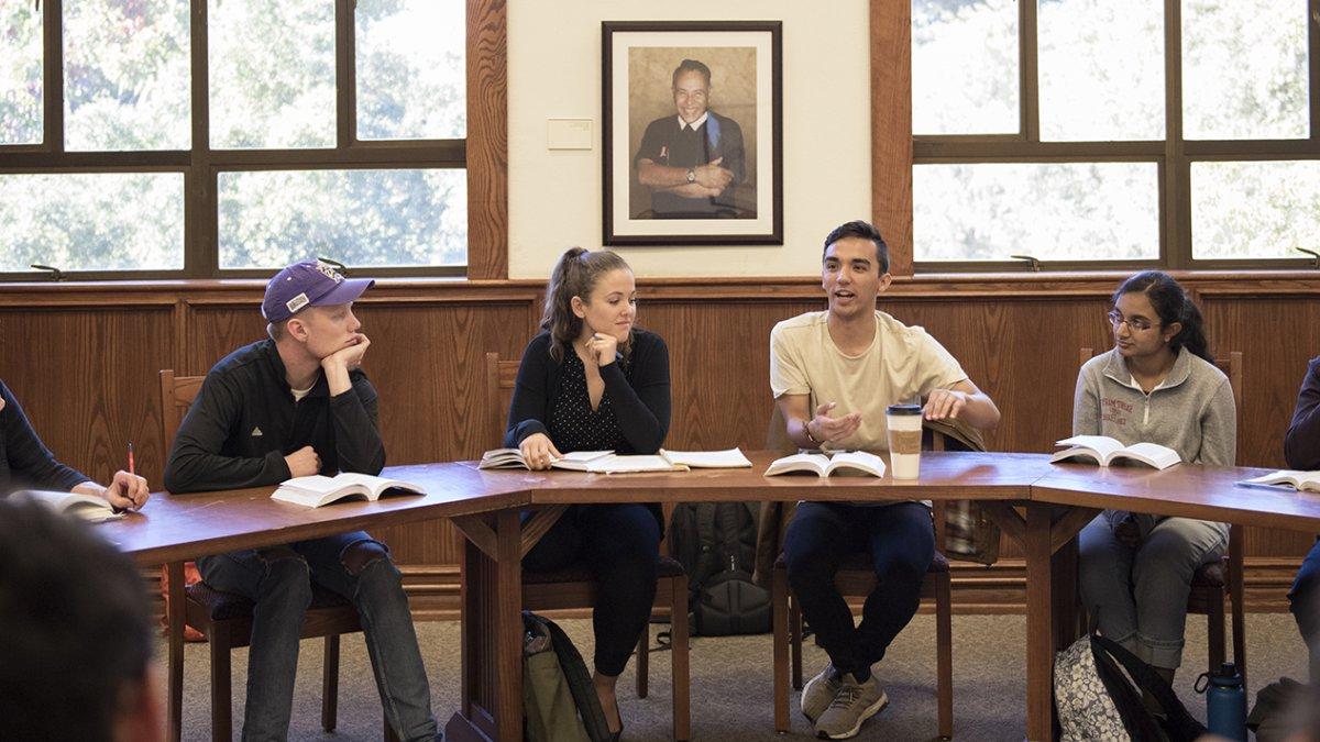 Students discussing a topic in a seminar class